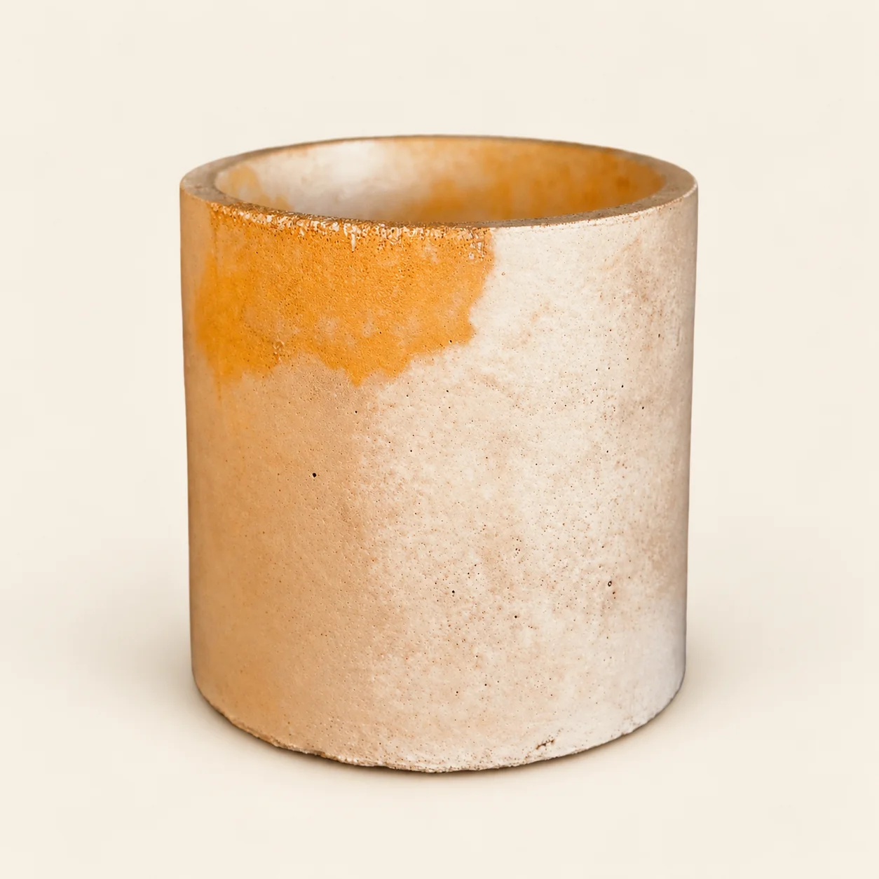 Amber Stone: Alternate studio view of the Amber Stone cream and amber concrete vessel